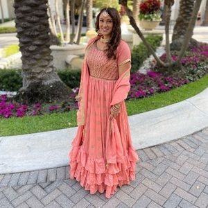 Sharara style coral colored Lehenga with gold